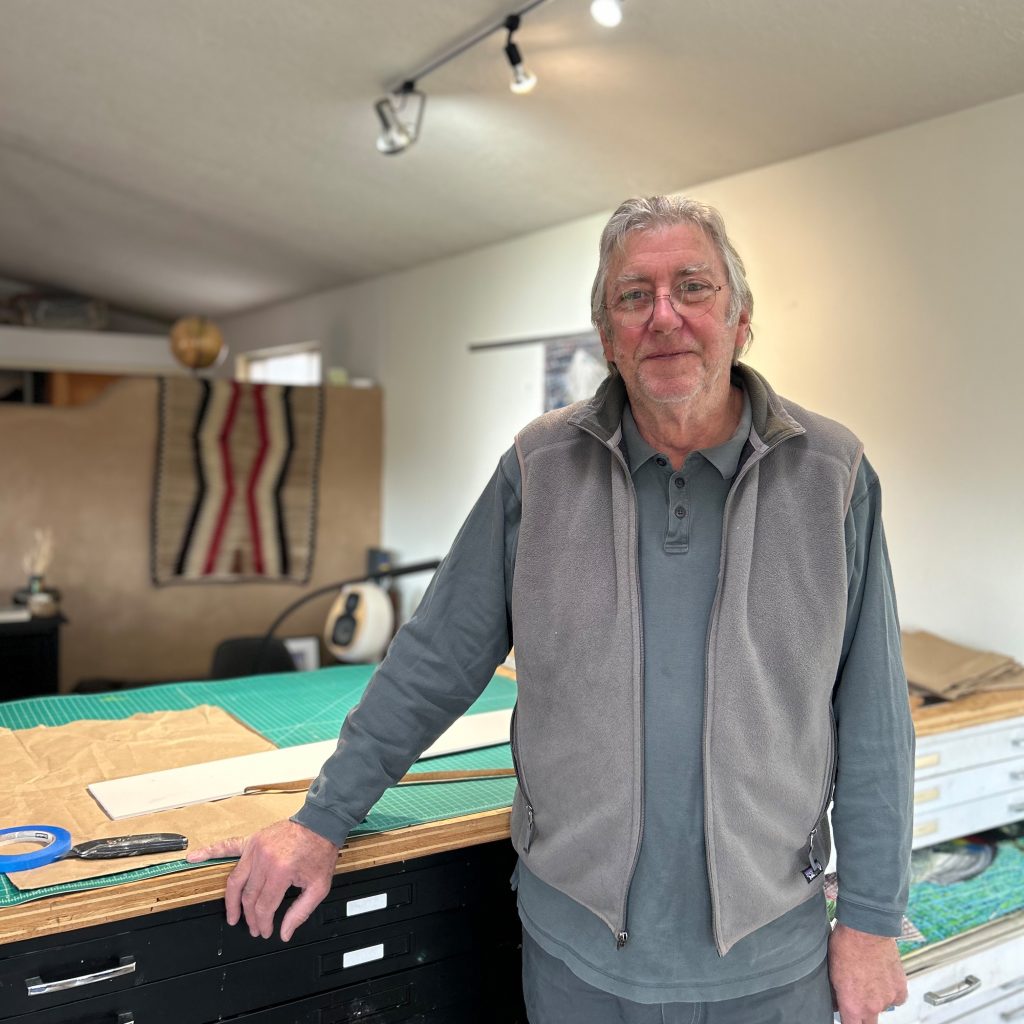 photo of the artist in his studio in corrales